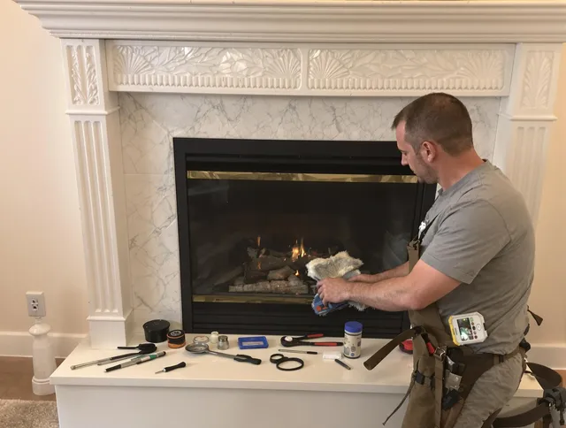 St. Simons Chimney Sweep performing fireplace maintenance in St. Simons, GA